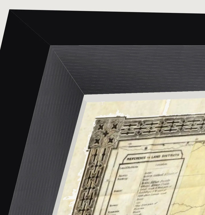 Float mount picture frame with a print raised on spacers, showing the deckled paper edge and shadow gap
