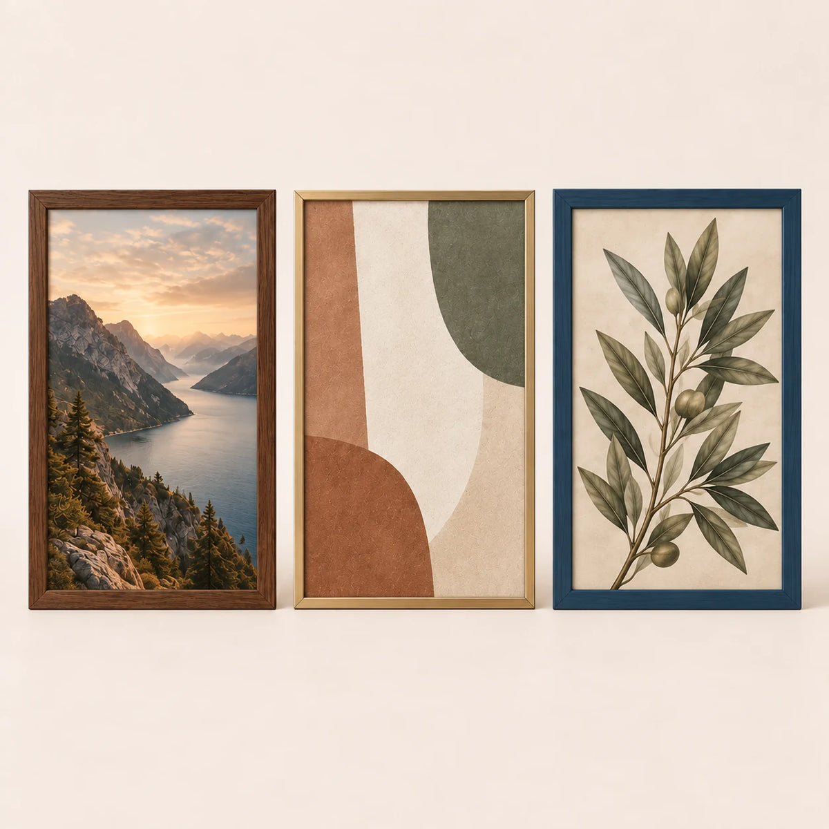 Three 15 by 23 inch picture frames in walnut, champagne brass and slate blue finishes with varied artwork