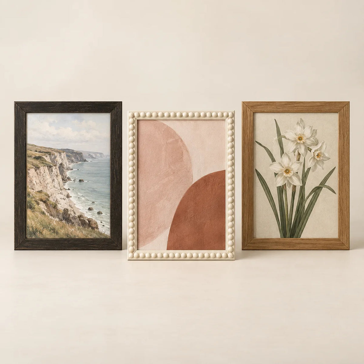 Three picture frames illustrating the 8 by 12 inch size