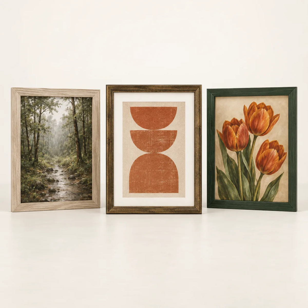 Three picture frames illustrating the 9 by 12 inch size
