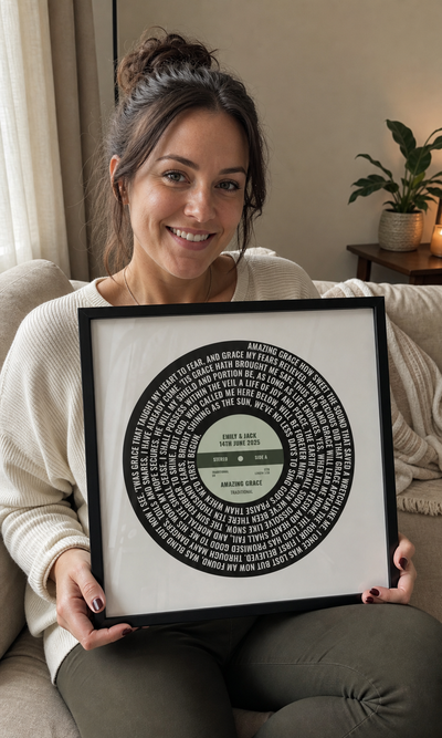 Customer holding a personalised Amazing Grace vinyl lyrics print