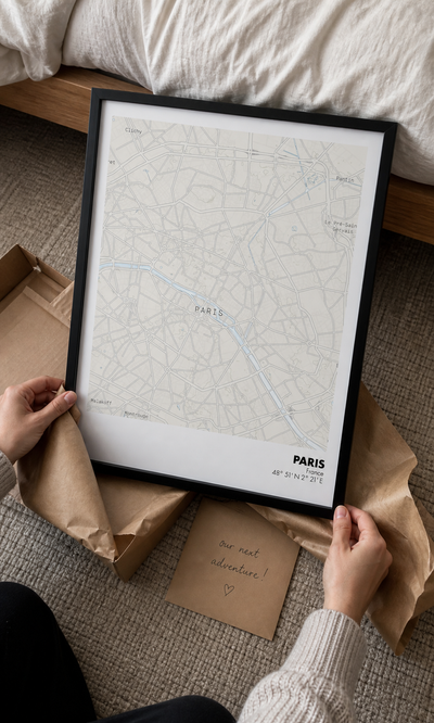 Customer unboxing a pastel personalised Paris map