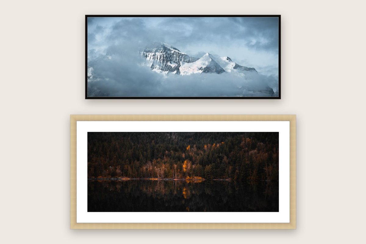 Two panoramic frames, 60x25cm — one in matt black aluminium, one in ash with a wide mount