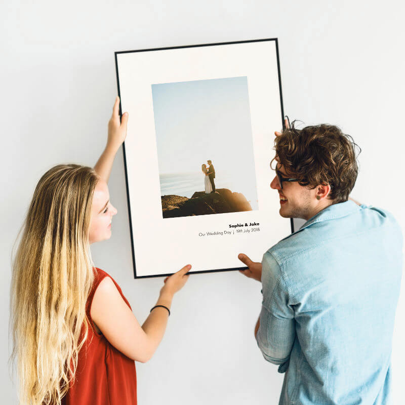Framed photo print with a personalised caption printed beneath the photo
